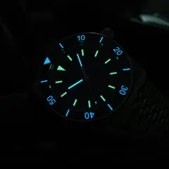 Aquatico Pacific Diver lume shot showing the lumed bezel