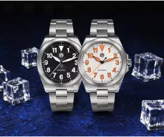 San Martin SN0132-1 field watches with black and white vortex-pattern dials, the white with orange numerals