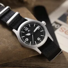 Militado ML05 (VH31) with black 3-6-9-12 dial and white seconds hand on black nylon strap