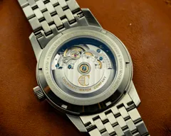 Cincinnati Watch Company Stripes (2026), Sellita SW200-2 Power+ through the display caseback, on the seven-link steel bracelet