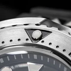 Addiesdive AD2509 close-up of the steel bezel insert and its lumed pip