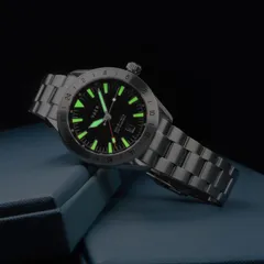 Vaer G2 Pacific Steel GMT 42mm in the dark, markers and hands glowing green