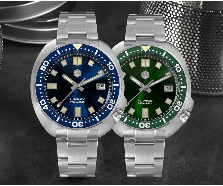 San Martin SN047-G-B 44mm turtle-case divers with blue and green sunray dials and ceramic bezels on steel bracelets