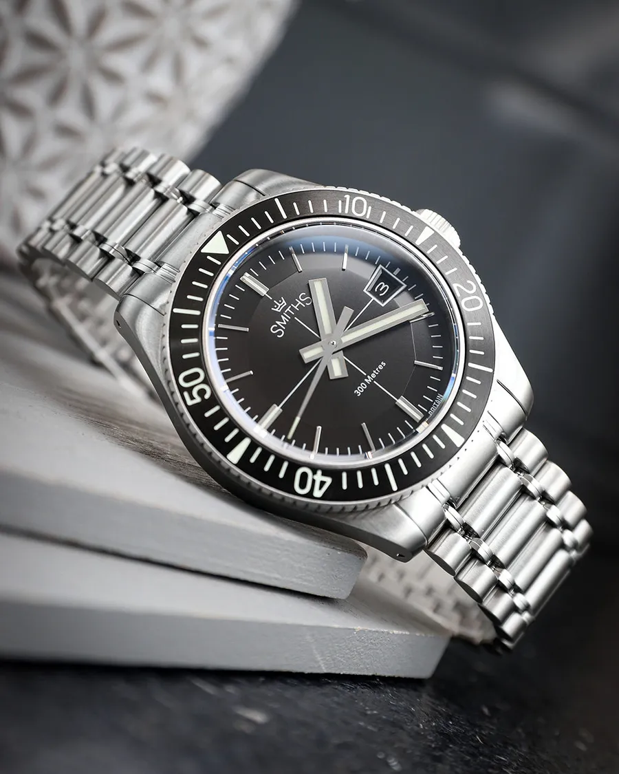 Timefactors Smiths Commander 71 PRS-71, black pie-pan dial with skeleton baton hands, black lumed bezel and date at 3, on steel bracelet