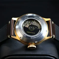 Aquatico Bronze Horizon Hawk GMT sapphire display caseback with the Aquatico rotor