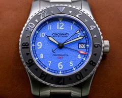 Cincinnati Watch Company Cincinnatus GMT, blue grained dial with date at 3, black ceramic 24-hour bezel, on steel bracelet