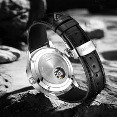 Cadisen C8188 caseback with a small window over the balance, and butterfly clasp