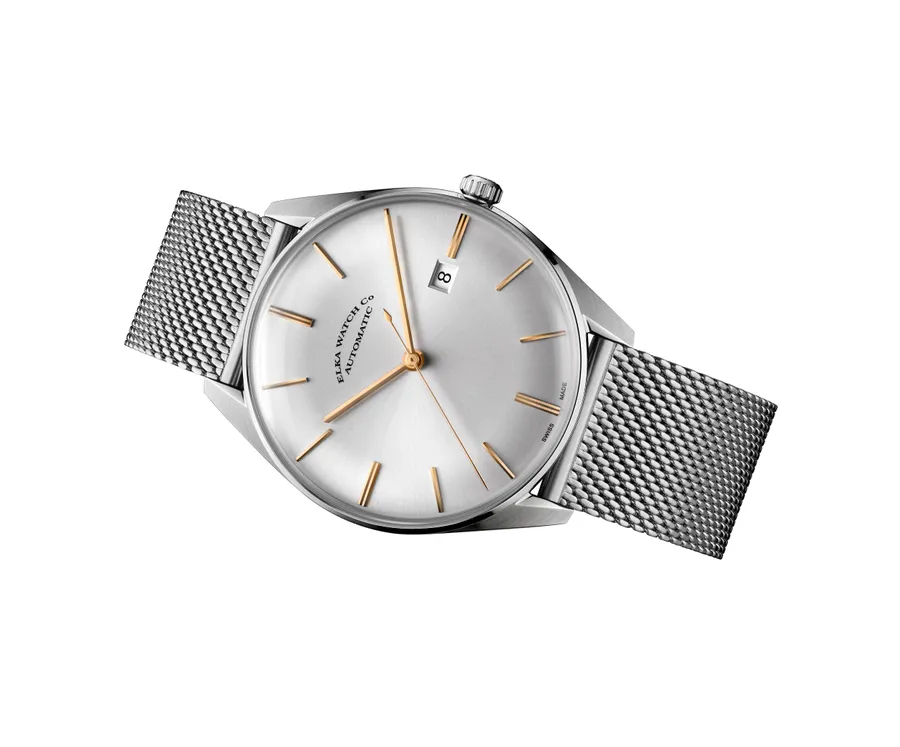 ELKA D01-1001, silver dial with rose-gold applied indexes and date at 3, on Milanese mesh