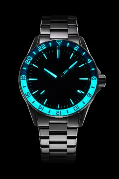 Zelos Spearfish GMT Meteorite lume shot with the lower half of the bezel fully lumed