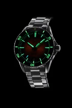Zelos Spearfish 40mm Diver Burnt Orange lume shot with lumed dive bezel