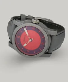 Schofield Strange Lights Not Quite Red in titanium with a red dial on a grey strap