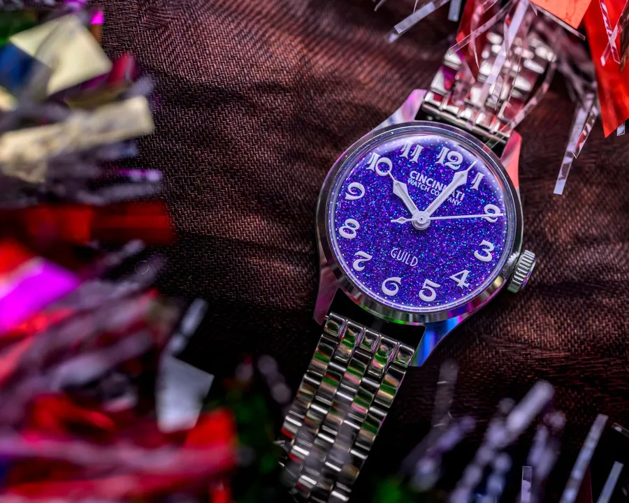 Cincinnati Watch Company Ladies Guild, shimmering purple dial with white numerals, on steel bracelet