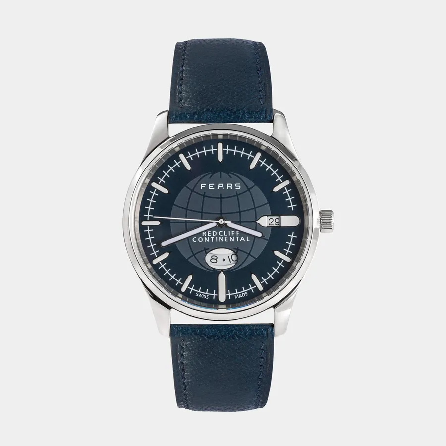 Fears Redcliff Continental with glossy Fears Blue dial, globe emblem, date at 3 and oval 24-hour window at 6, on a blue leather strap
