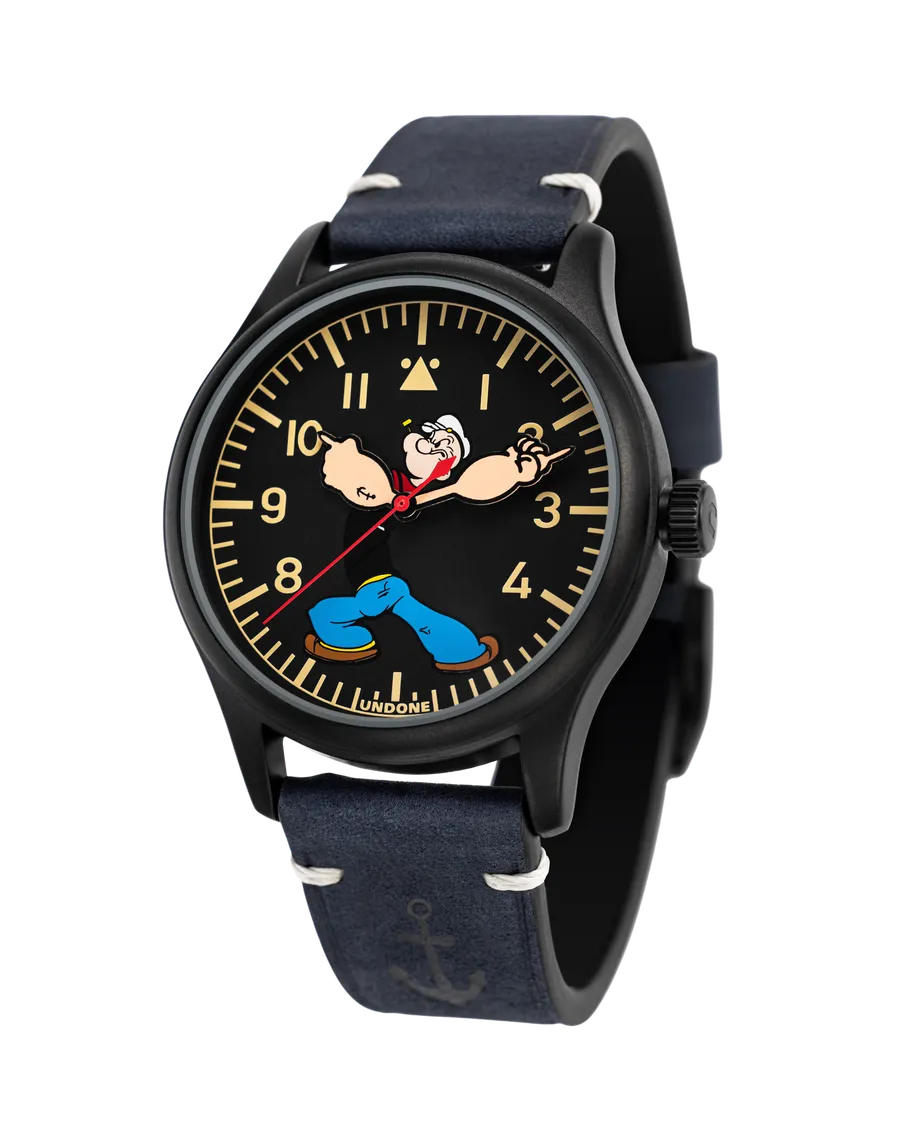 Undone x Popeye 95th Anniversary Limited Edition with black case and black pilot-style Popeye dial on a navy leather strap