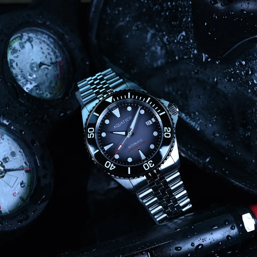 Aquatico Ocean Diver with black sunburst dial, black 60-minute bezel and date, on the jubilee-style bracelet