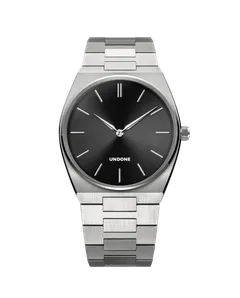 Undone Slim with black sunray dial on its integrated steel bracelet