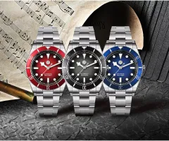 San Martin SN0138-B2 divers with gradient red, black and blue dials and matching bezels