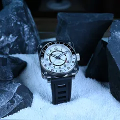 Aquatico Steel Man GMT with full-lume white numeral dial, on black rubber strap