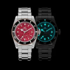 Thorn T029 garnet dial in daylight beside a lume shot of the blue BGW9 markers