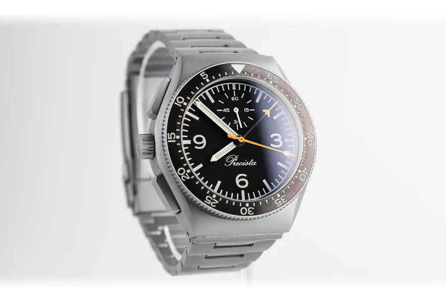 Timefactors Precista Mission Timer PRS-56 with ceramic bezel, black dial with running seconds at 12 and orange chronograph hands, on steel bracelet