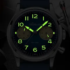 Addiesdive AD2516 lume shot of the blue dial, with green-glowing numerals and hands