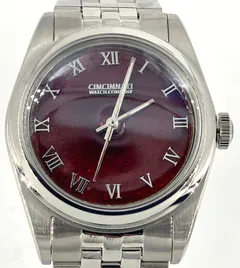Cincinnati Watch Company Enamel over Hammered Finish, transparent rust red enamel over a hammered silver dial with applied Roman numerals, on a five-link bracelet