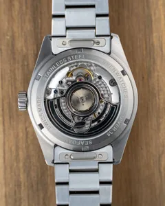 Wren Diver 38 Seafoam display caseback with wren-shaped rotor (2025 launch photo)