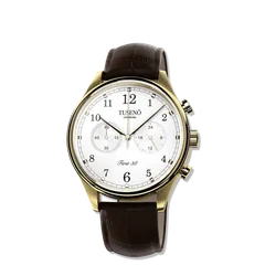Tusenö First 38, gold case, white dial, on brown leather strap