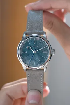 Selten Grand Feu Enamel Spiral Moonstone, held in hand