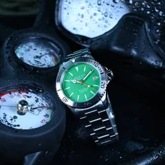Aquatico Dolphin with green dial