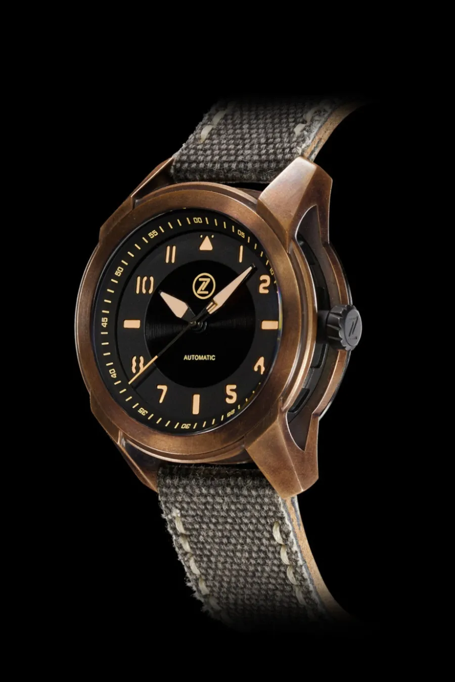 Zelos Eagle E-1C, bronze outer case over a black DLC inner case, black dial with vintage numerals, on canvas strap