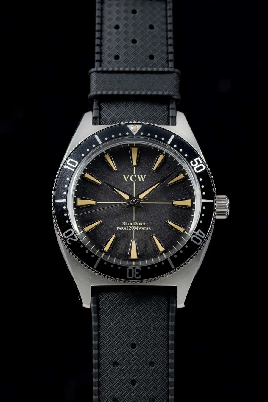 Pook VCW with black dial, gilt print and black dive bezel on a black tropic-style strap