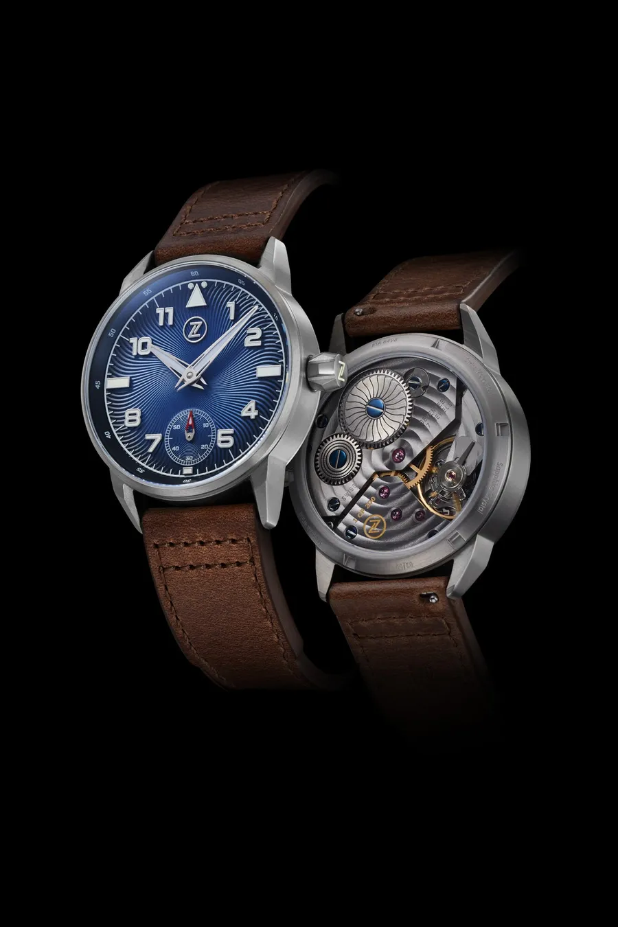 Zelos Skyraider in titanium, Atmosphere Blue dial with small seconds at 6, front and display back, on brown leather strap