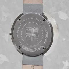 Solid printed caseback of the HKDS edition, held by four screws