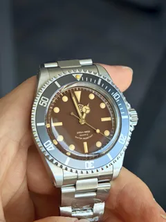 Watchdives WD5514Q with tropical brown dial and yellow indices on the 3-link bracelet (the brand's temporary photo)
