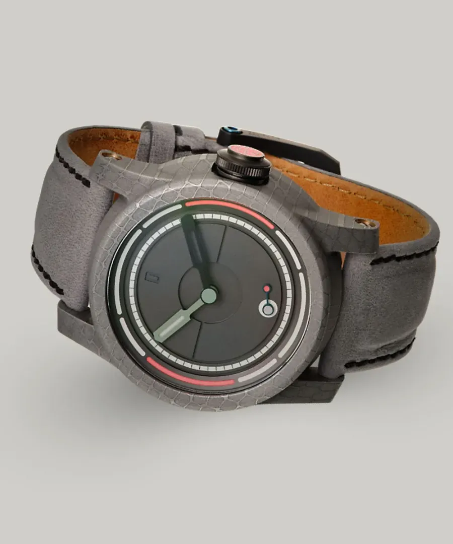 Schofield Obscura in cellular Damascus steel with a grey rhodium dial on a grey leather strap