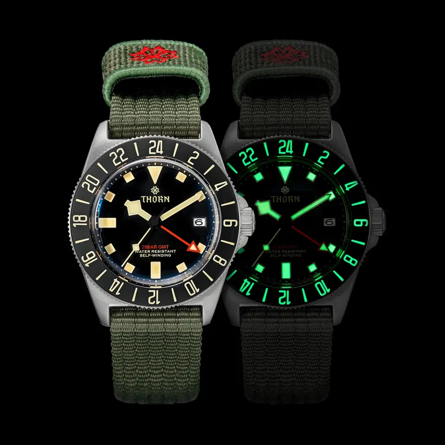 Thorn T020 titanium GMT diver with black dial, red GMT hand and black 24-hour ceramic bezel on an olive nylon strap, beside a lume shot