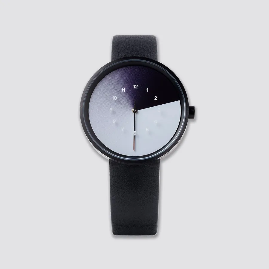 Anicorn TTT#1 Hidden Time Midnight: a rotating gradient disc reveals the hour numerals printed on the glass