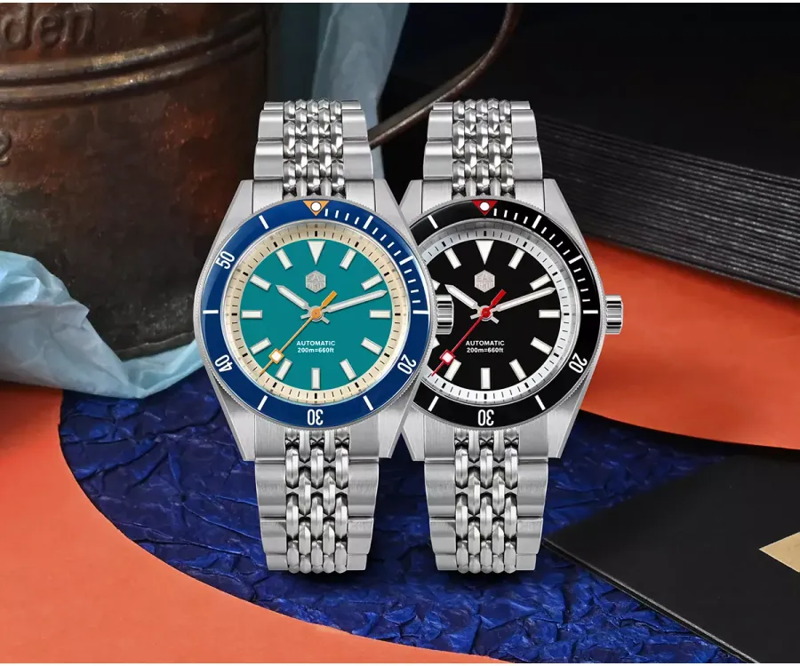 San Martin SN0115-G with light blue and matte black dials on seven-link bracelets