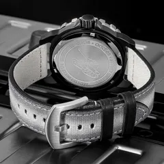 Addies MY-057 solid caseback engraved "5ATM, addies, MY057, All stainless steel" with a tank motif