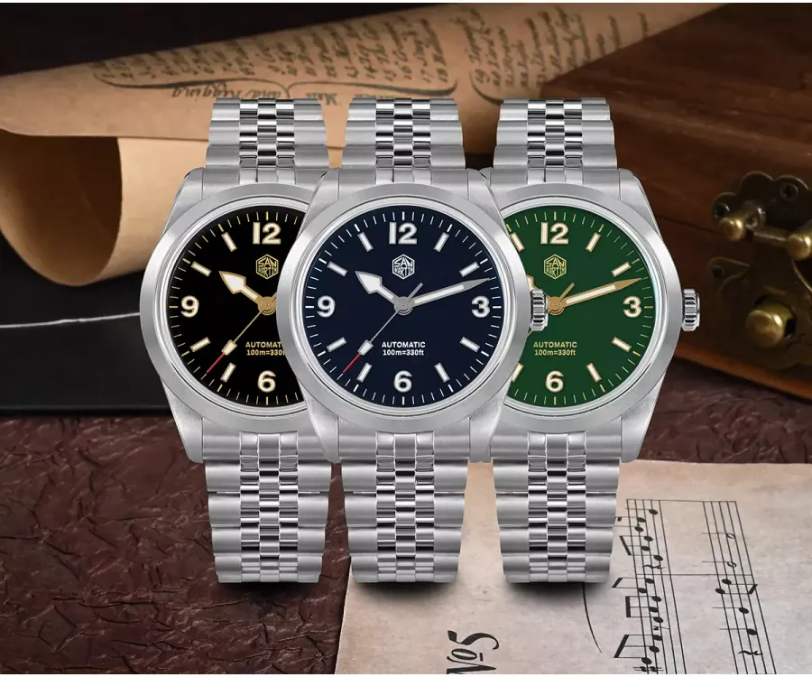 San Martin SN0107-B with black, blue and green enamel dials on five-link steel bracelets