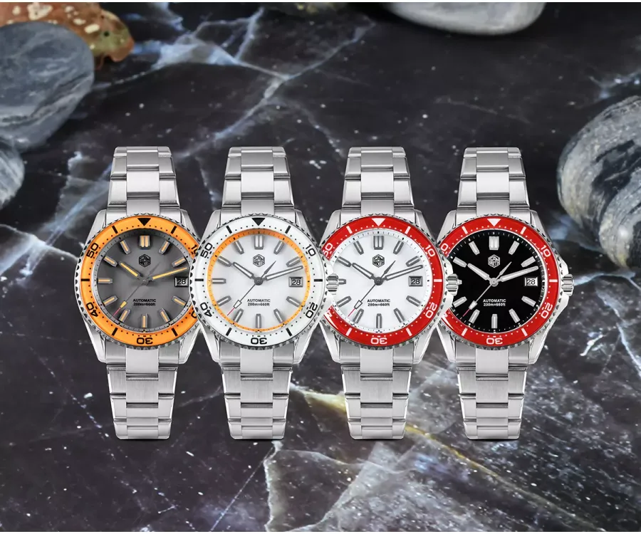 San Martin SN0129-D-CP divers with grey dial and orange bezel, white dials with white and red bezels, and black dial with red bezel