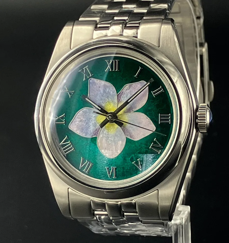 Cincinnati Watch Company Springtime, cloisonné enamel violet flower on a teal green dial with Roman numerals, on a five-link bracelet
