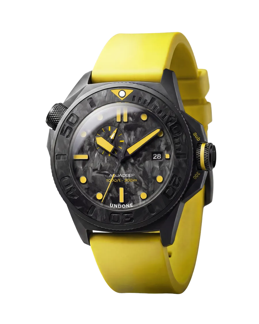 Undone Aquadeep Submerge Carbon with black DLC titanium case, forged carbon dial and yellow accents on a yellow rubber strap