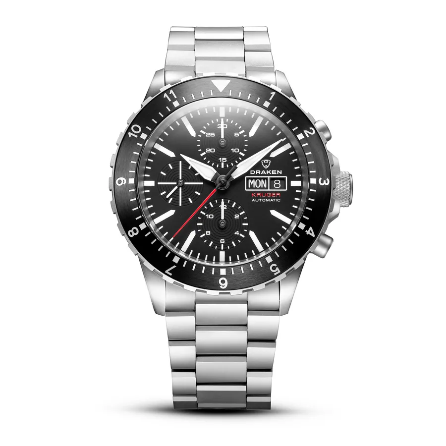 Draken Kruger Auto with a black dial, day-date window and 12-hour bezel insert on the titanium bracelet
