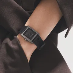 echo/neutra Rivanera Piccolo Guilloché Black on the wrist, on black rubber strap