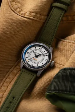 Astor+Banks Field Watch Polar, white full-lume dial, sandblasted steel case, on green canvas strap