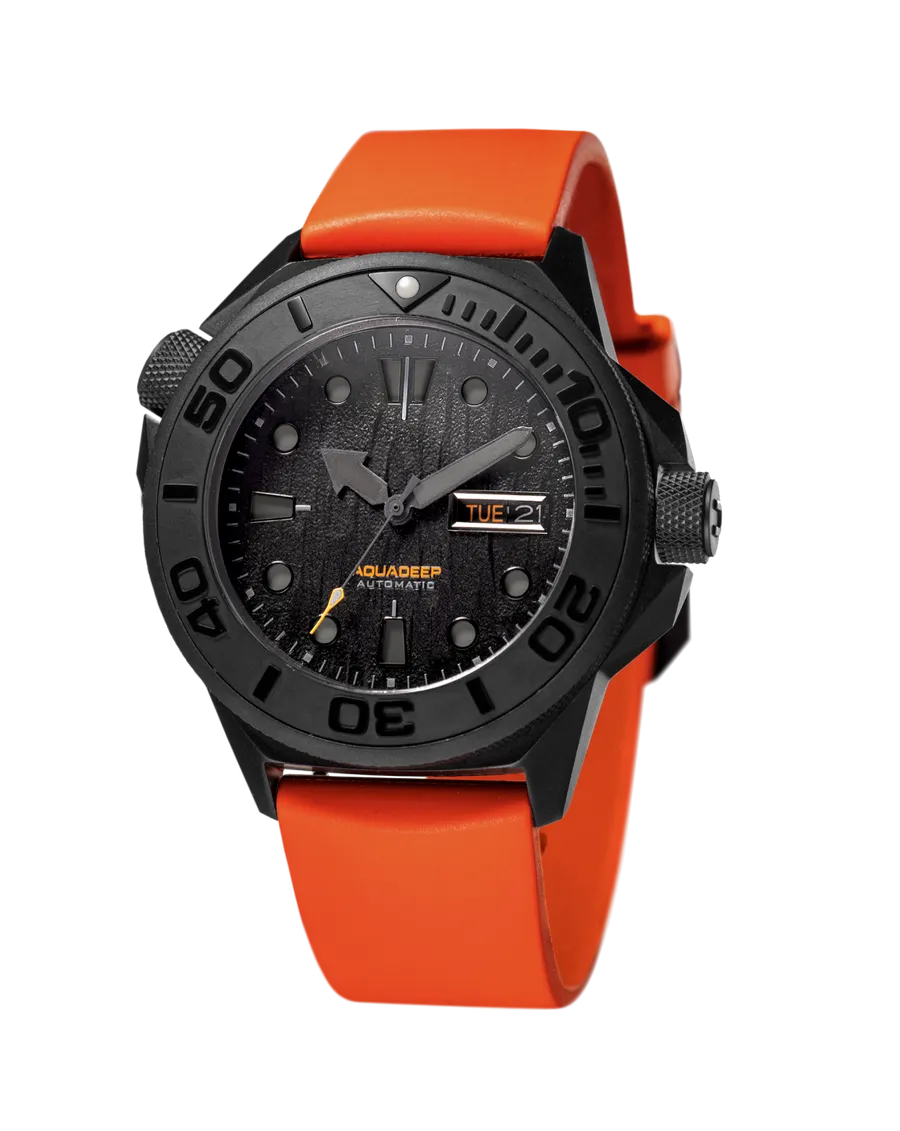 Undone Aquadeep Submerge with black DLC titanium case and textured black dial on an orange rubber strap