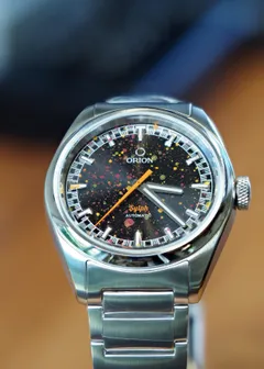 Orion Sylph Blood Orange, hand-painted speckled dial, on bracelet