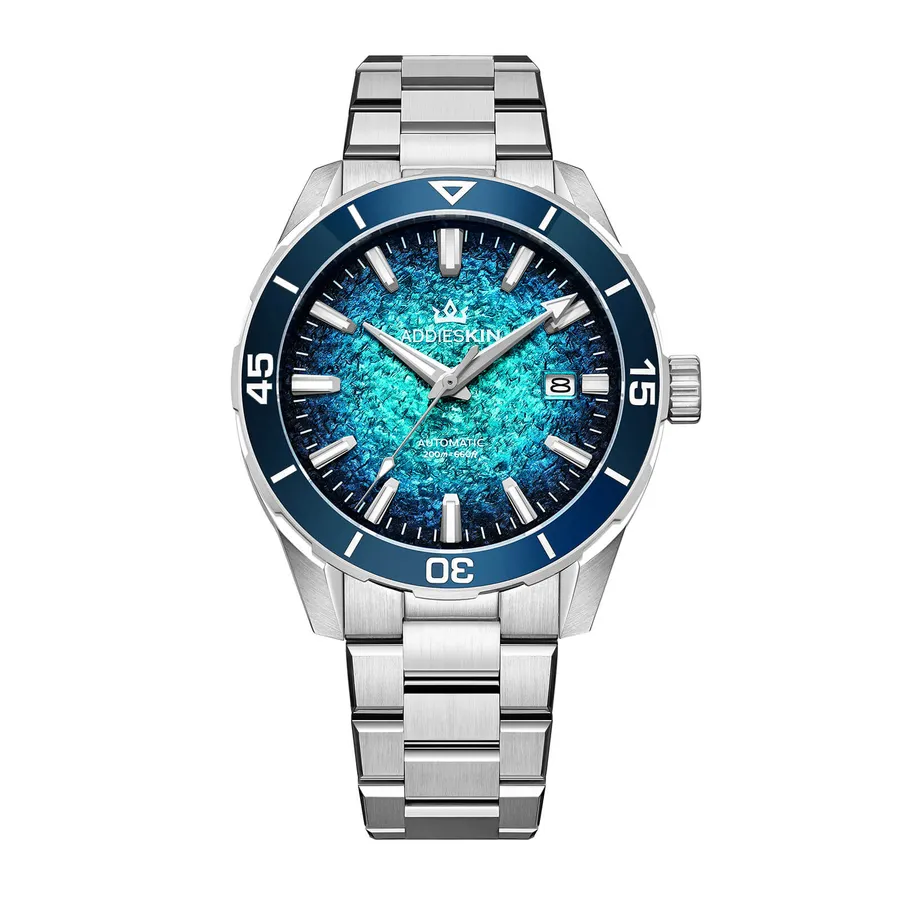 AddiesKIN K005 with blue-turquoise textured dial and blue ceramic bezel on a tapering steel bracelet
